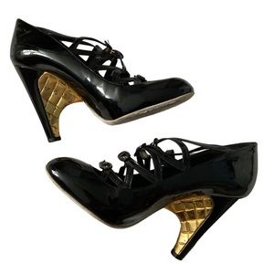 CHANEL black and gold heels